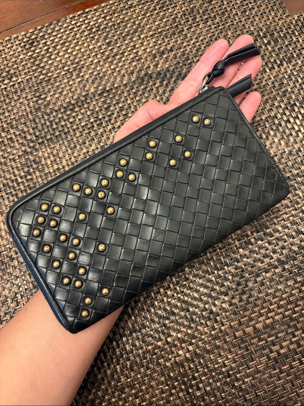 Bottega Veneta black Intrecciato zippy wallet with gold studs in excellent cond.